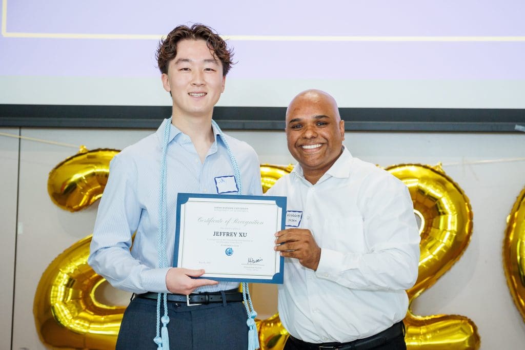 Jeffrey Xu received recognition for his contribution to the Economics club.